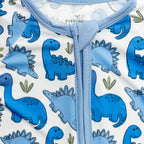 blue dinosaurs on white bamboo fabric pajamas neckline.
