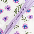 Purple zipper floral bamboo fabric with purple flowers and green leaves.
